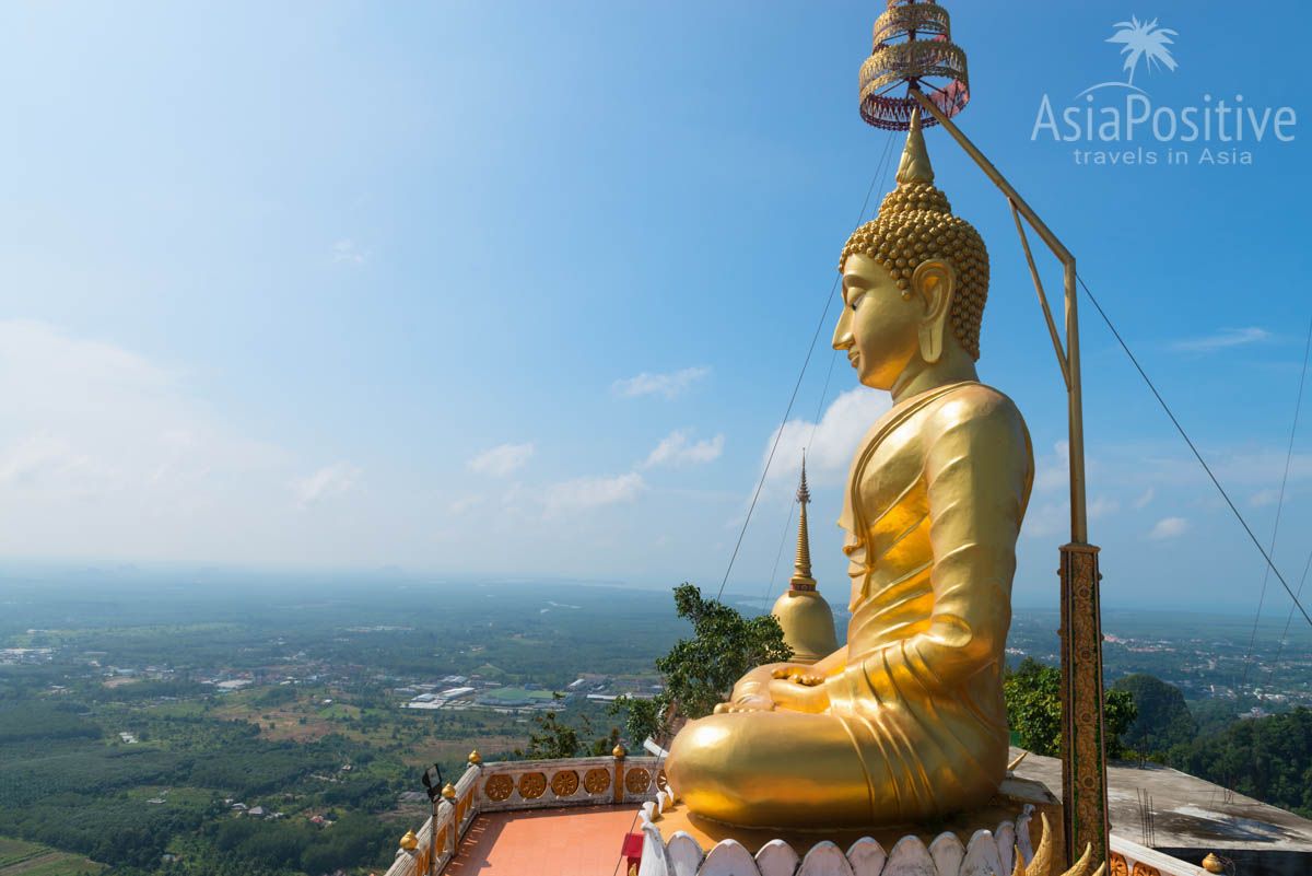 Статуя Будды на вершите скалы в Храме Пещеры Тигра | Краби, Таиланд | Путешествия по Азии с AsiaPositive