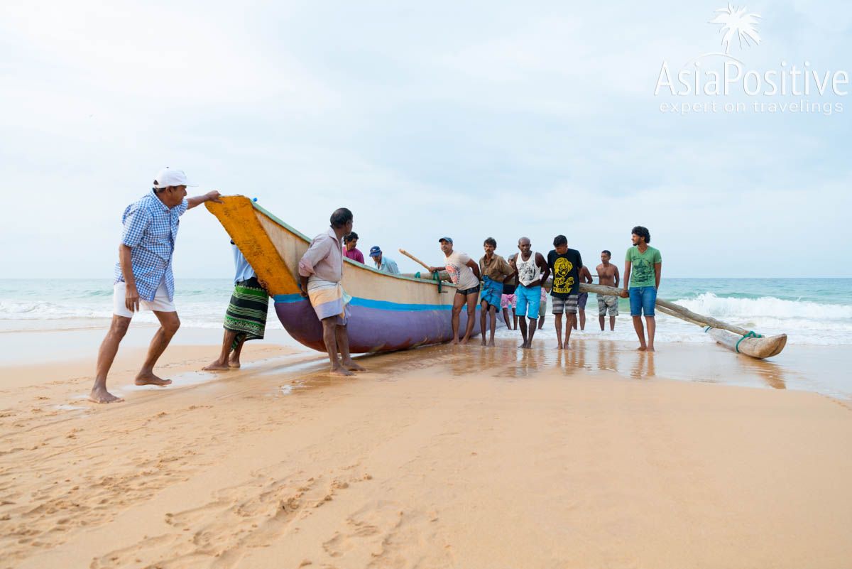 Locals swim and fish fully dressed